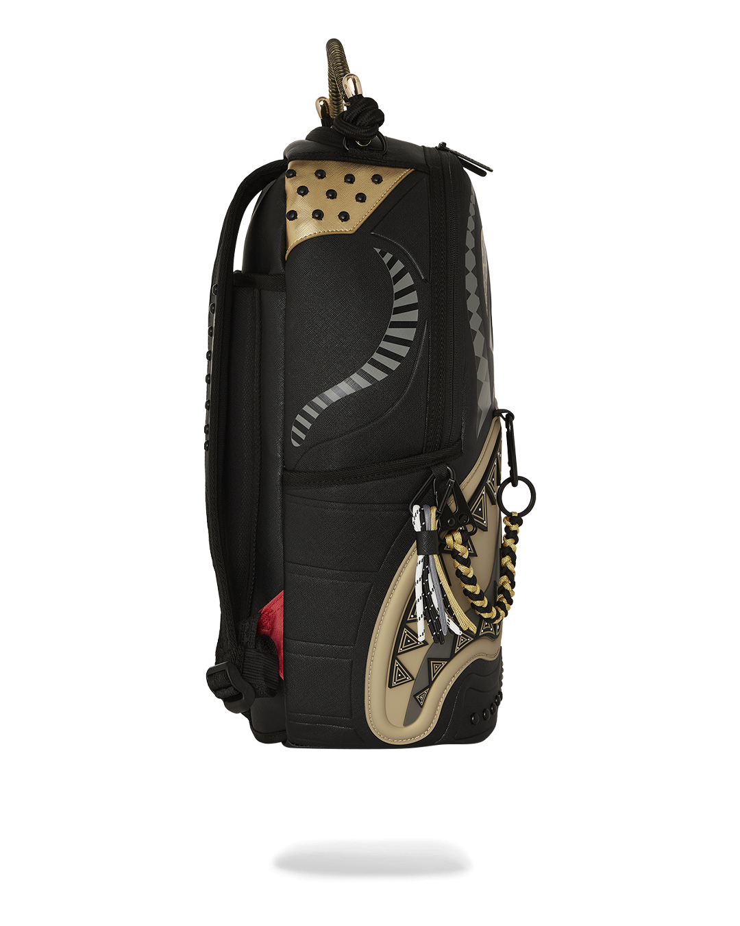 Close-up of gold zipper detailing and Sprayground badge on urban travel backpack
