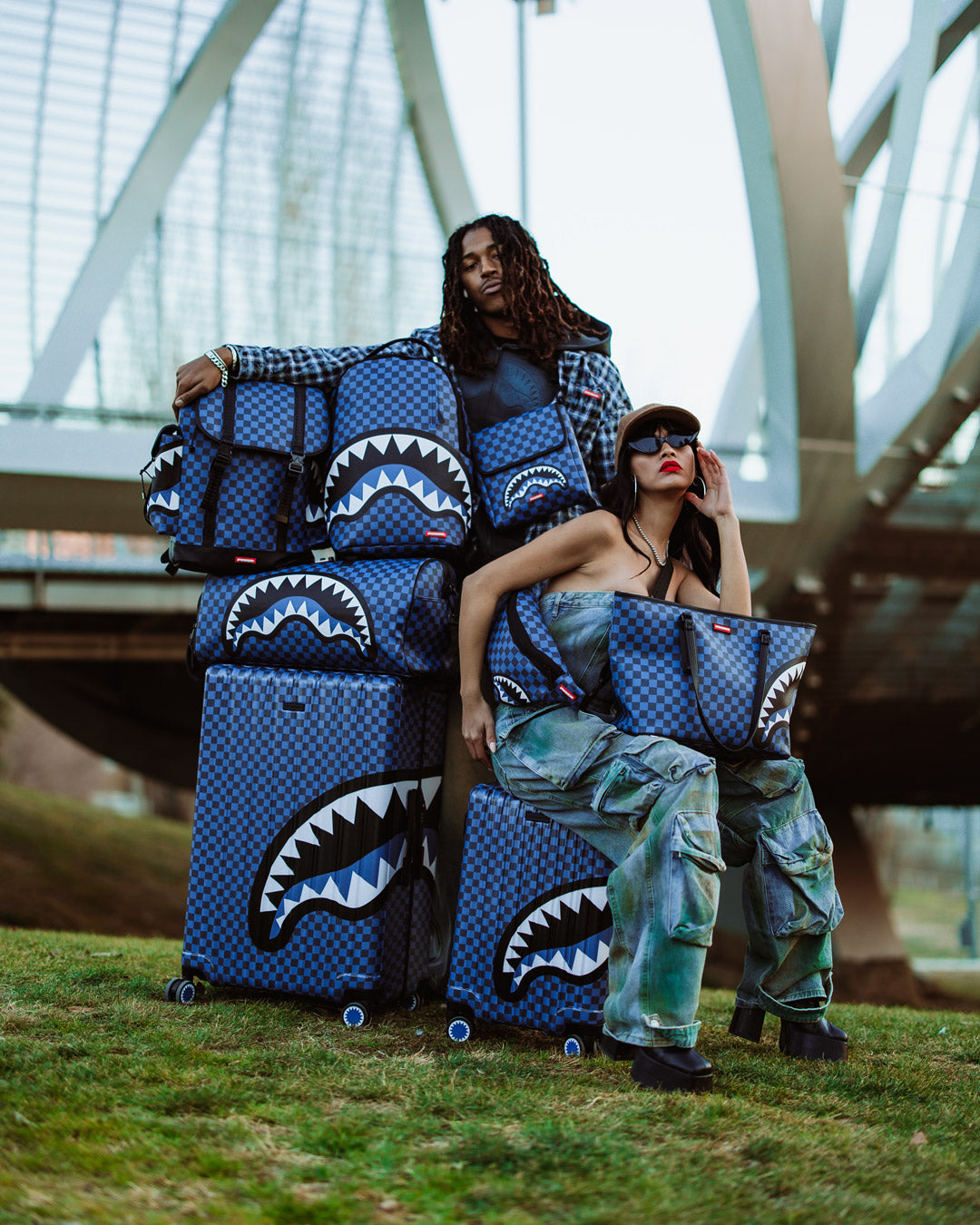 Sprayground Tote bag with animal print design, featuring a top zipper opening and double handle.