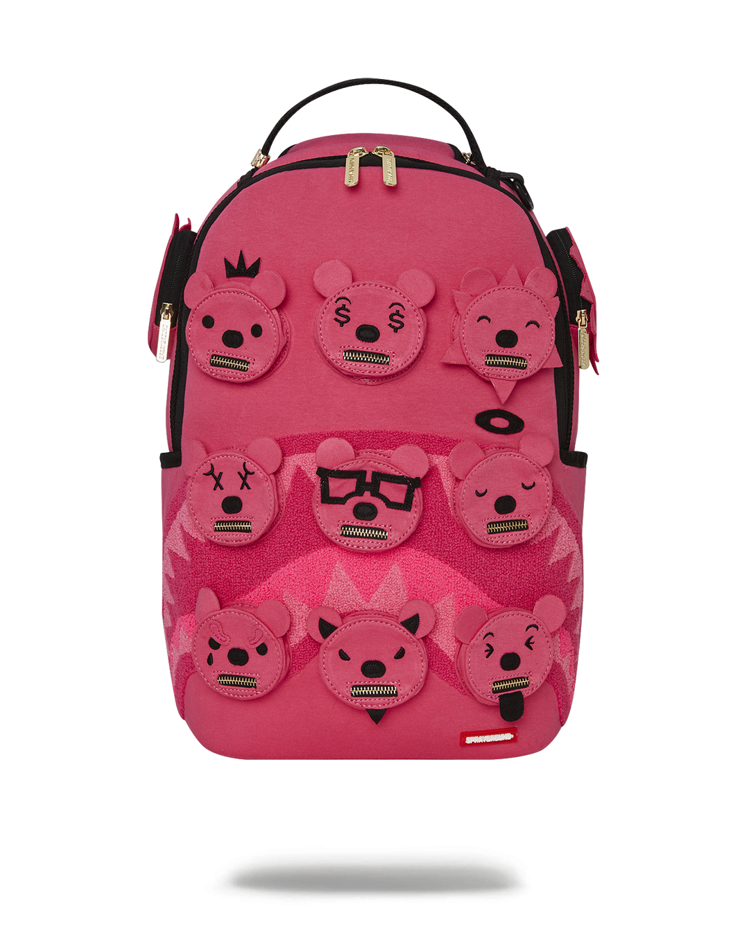 Front view of ergonomic backpack with bear head design and sharkmouth graphic