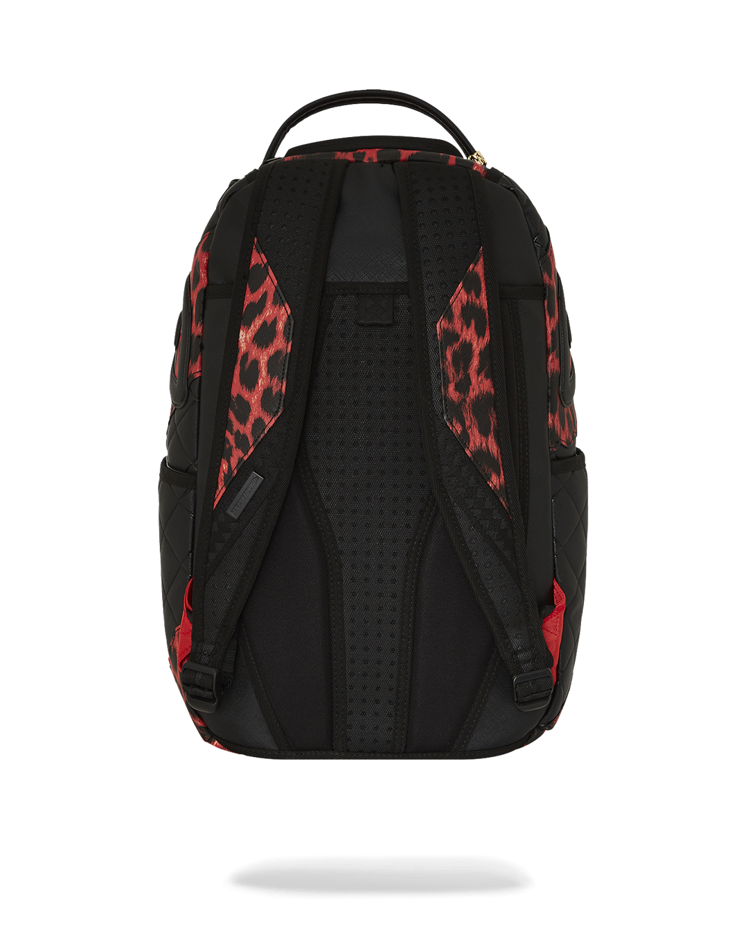 Front view of quilted backpack with leopard print and sharkmouth motif