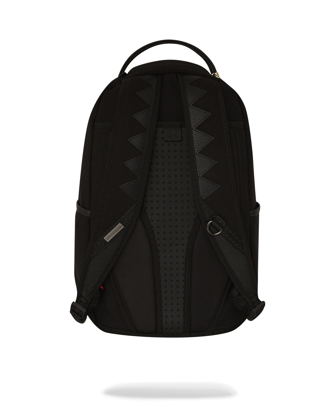 Sprayground Stealth Fang backpack in pink, showcasing its canvas material and PVC details.