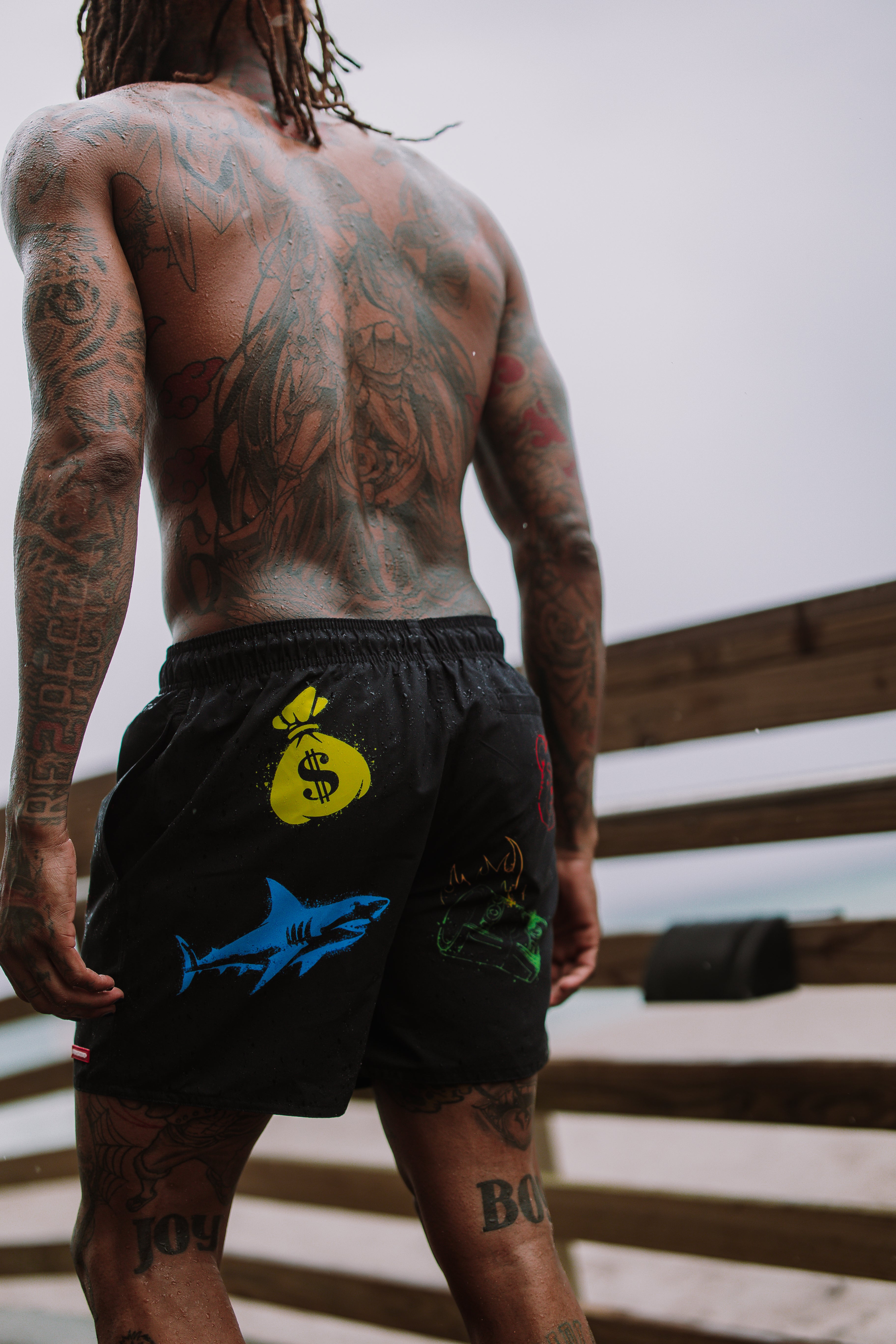 Close-up of Street Artist swim shorts fabric and waistband