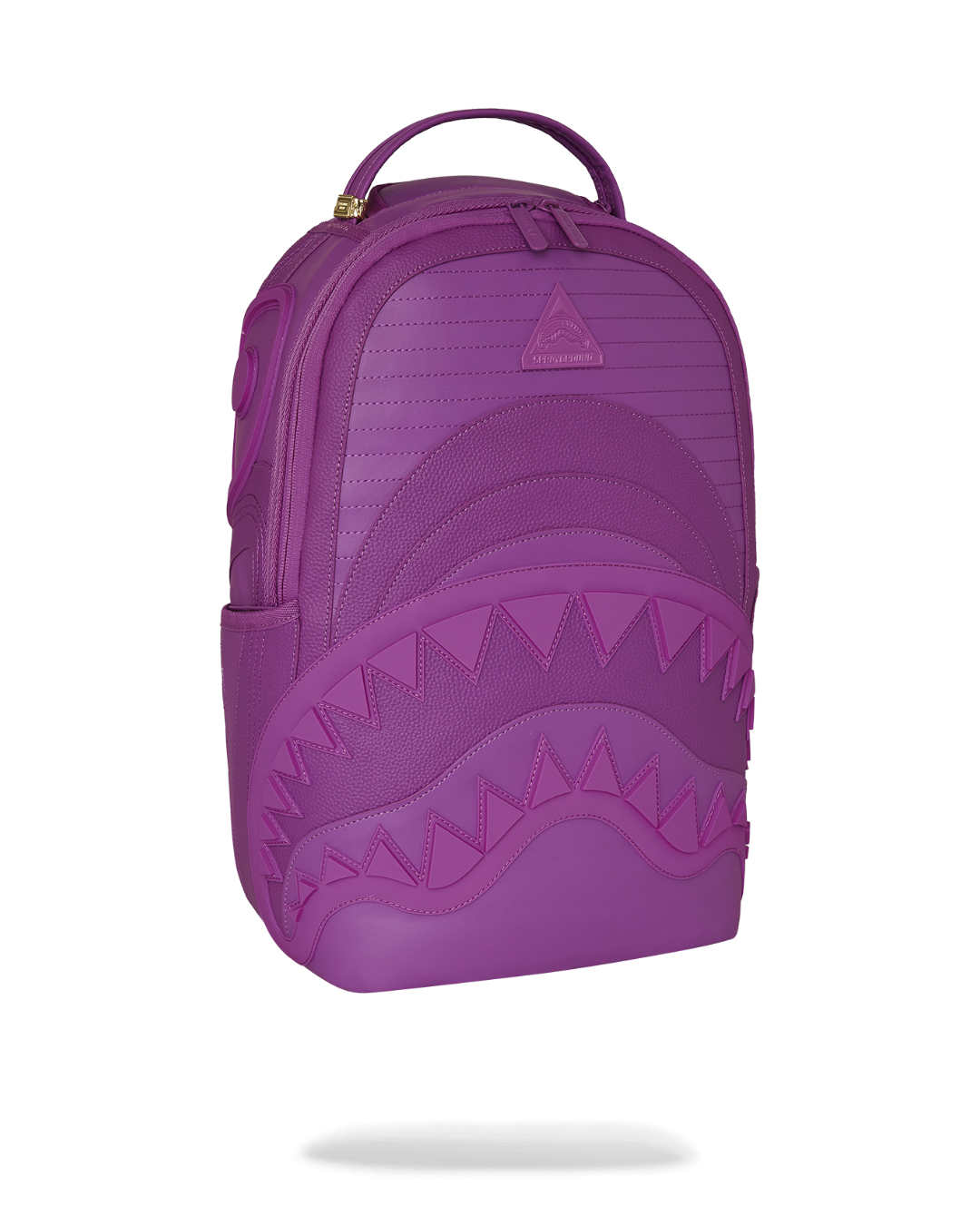 Backpack open showing velour laptop compartment and organizer pockets