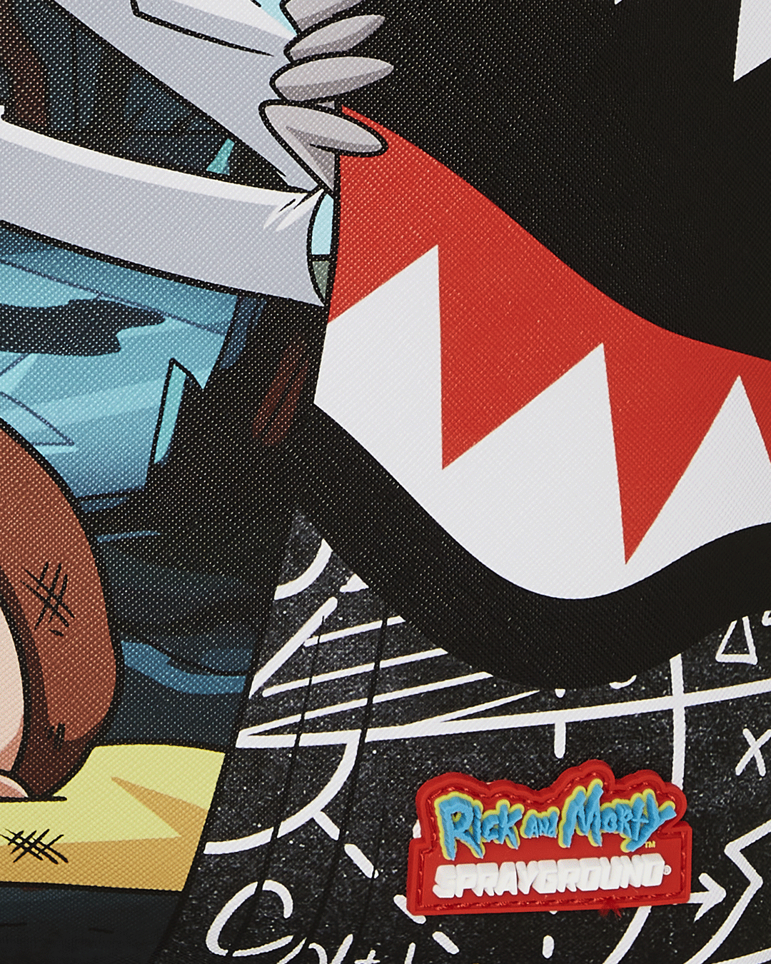 Interior of Rick and Morty backpack displaying laptop compartment and organizer pocket.