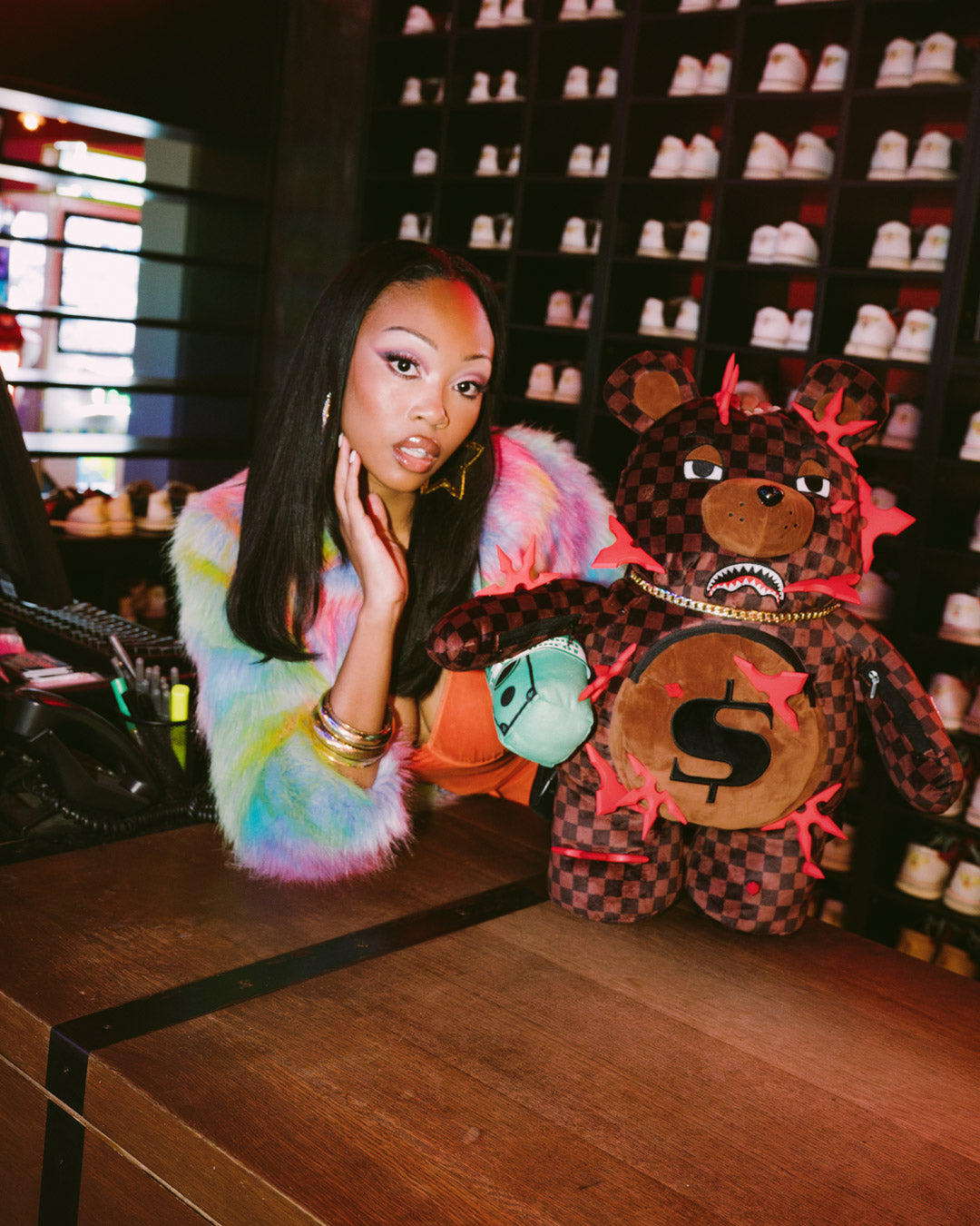 Front view of the sprayground teddy bear backpack with plush money bear design