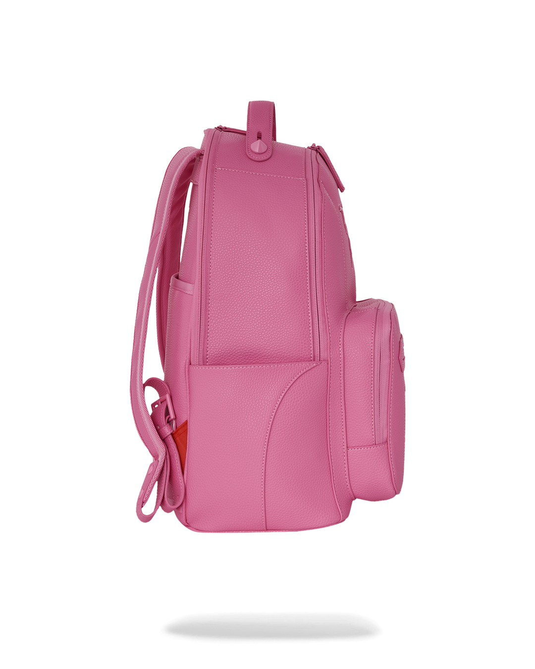 Side view of the ladies mini backpack featuring side pockets and water-resistant fabric