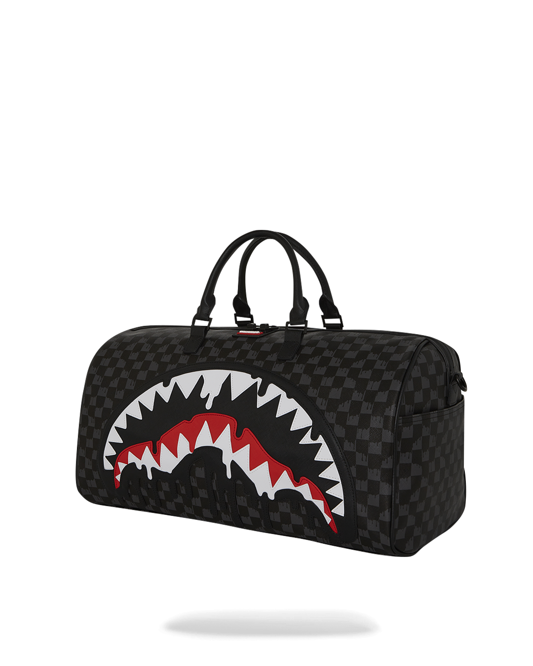 Interior shot of the leather duffle bag showing spacious compartments and metal hardware