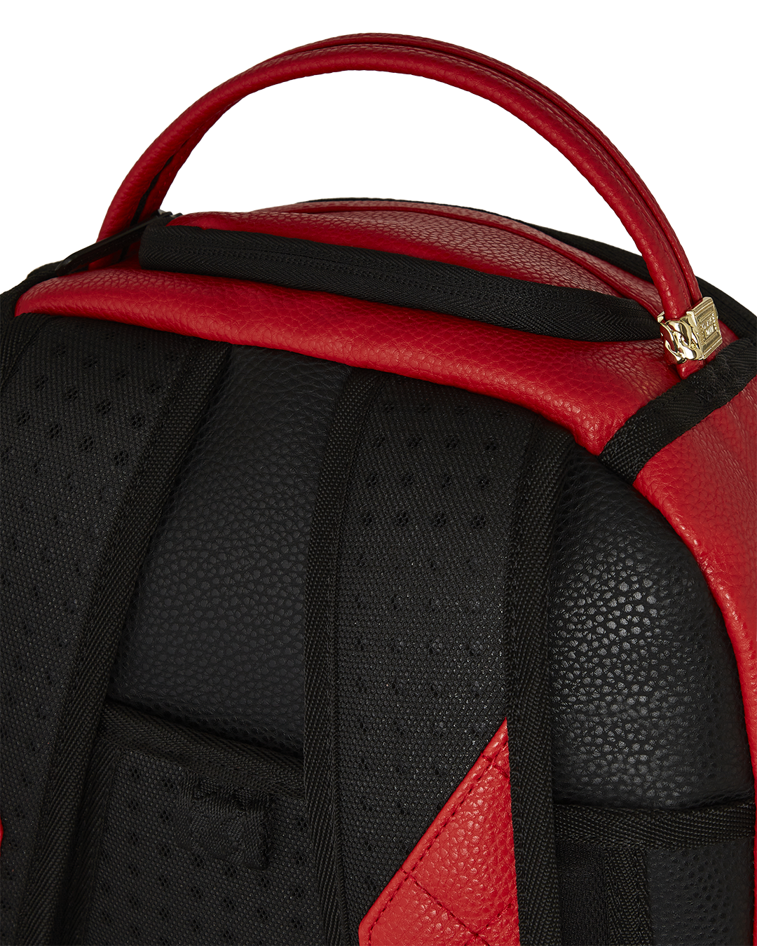 Front view of the embossed faux leather backpack with gold zippers shown against a city backdrop.