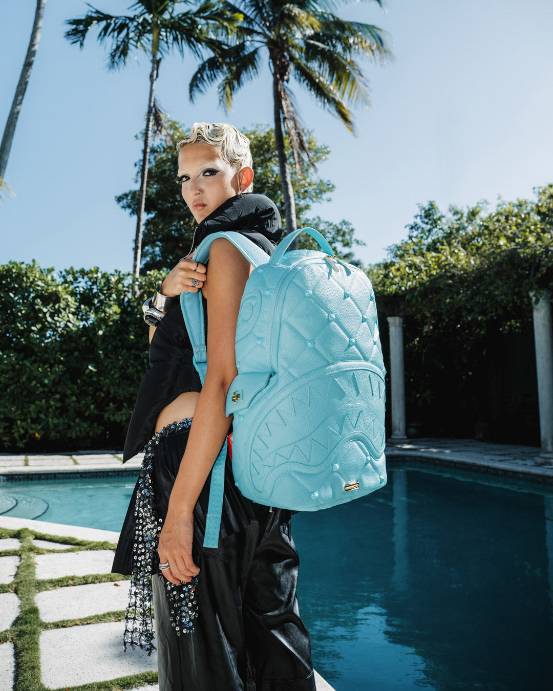 Limited edition Rococco Bear backpack in vibrant design with gold zippers.