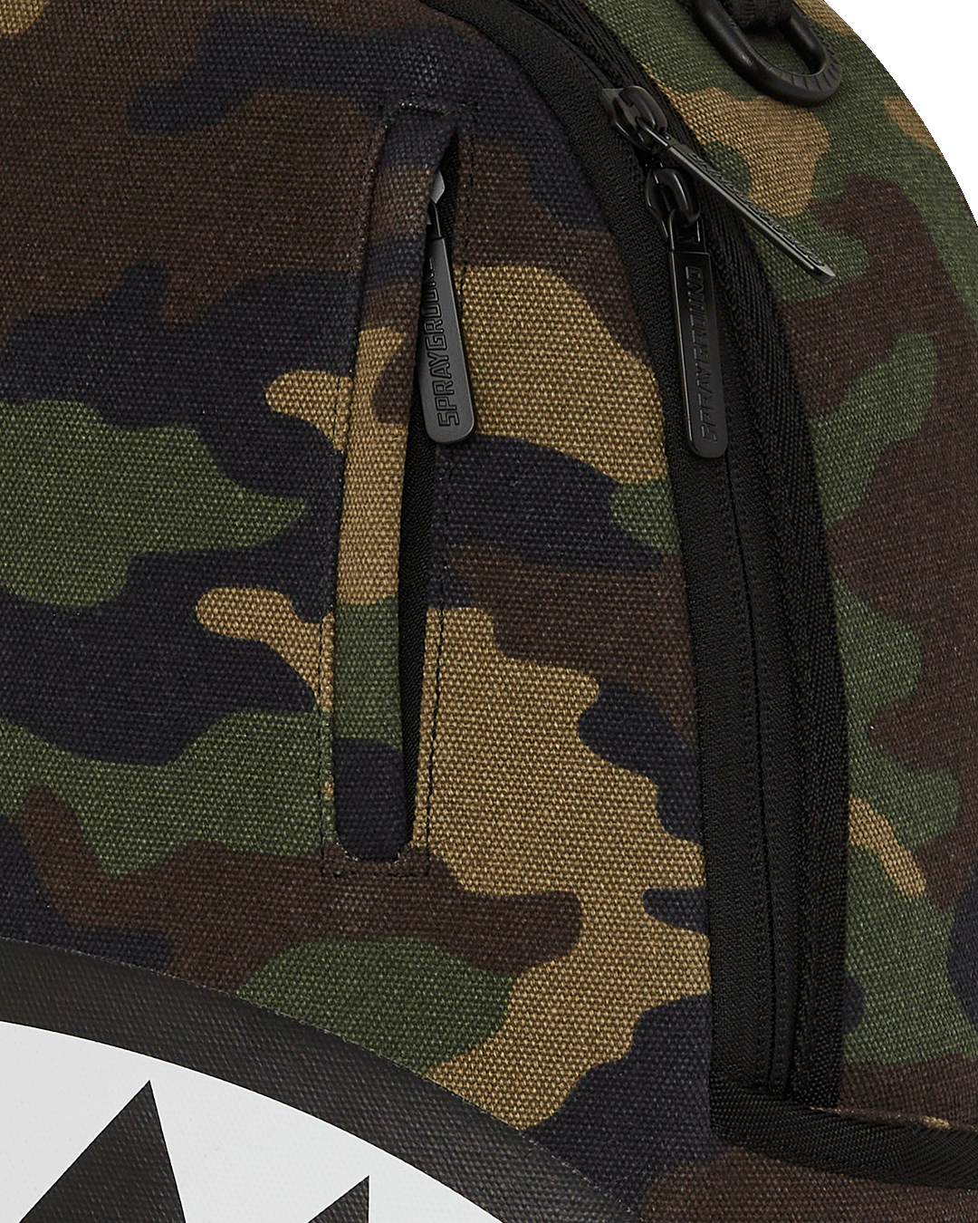 Backpack with laptop compartment open, showing velour lining and mesh pockets.
