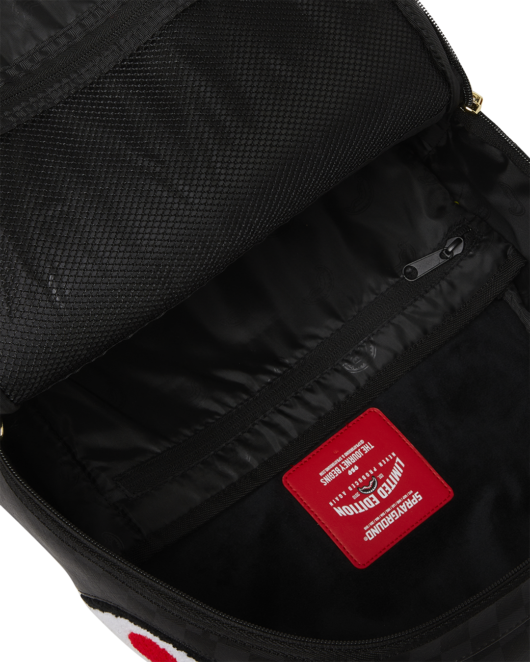 Side view of the faux leather backpack with ergonomic straps.