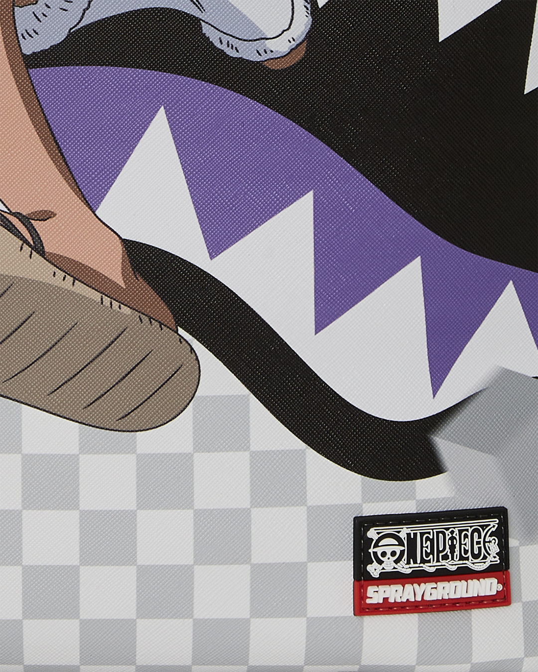 Sprayground One Piece Luffy backpacks interior, featuring a separate velour laptop compartment