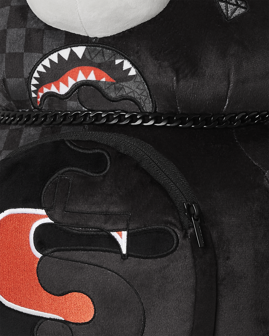 Sprayground Teddy Bear Backpack side view showing adjustable straps