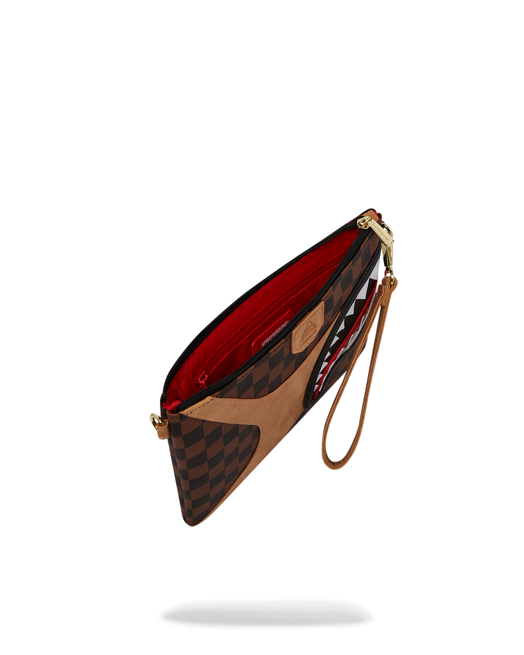 Hennyville Crossover Clutch being used as a crossover clutch with handle on front panel.