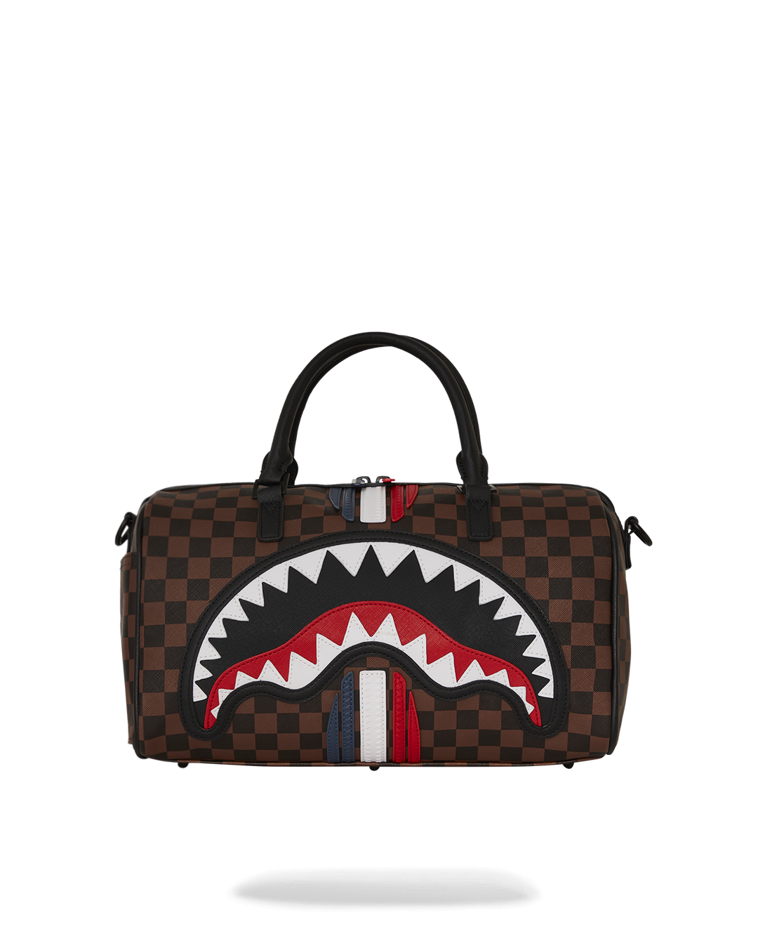 Mini faux leather duffle bag worn as a crossbody bag, showcasing its stylish design.