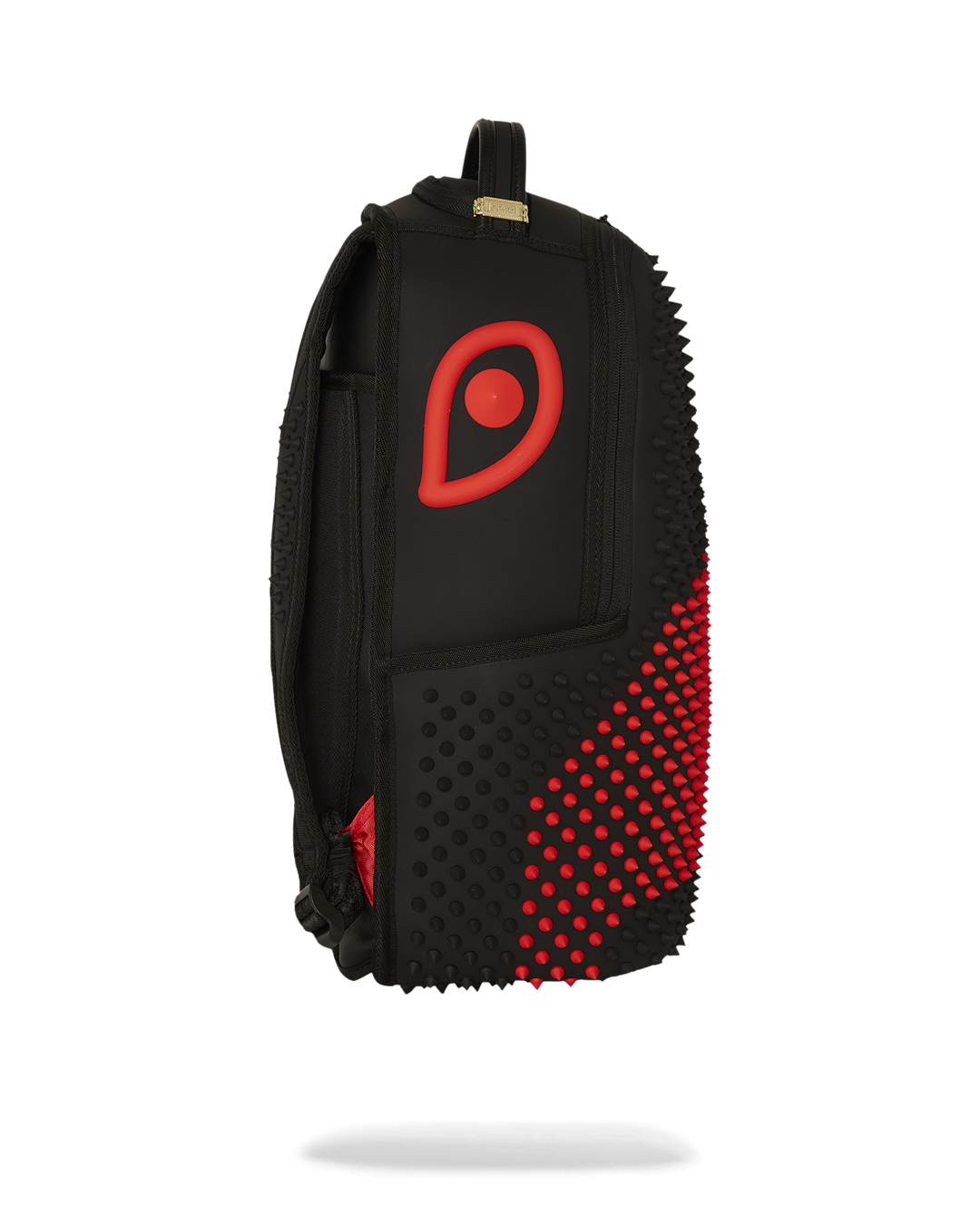 Side view of the faux leather mini backpack with adjustable straps.