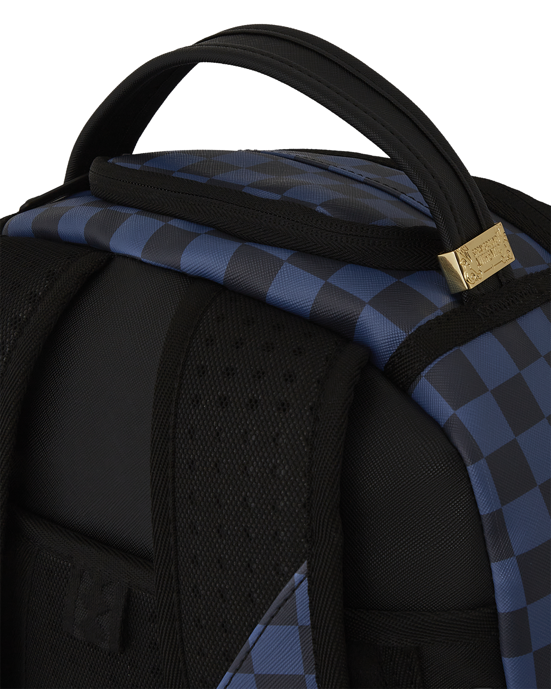 Close-up of the faux leather sharks backpack featuring shark mouth design and gold hardware