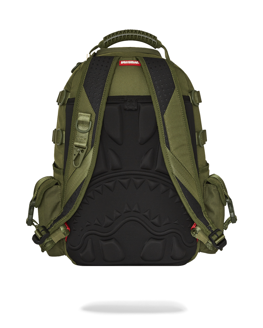 Close-up of Shark Squad tactical backpack showing organizational pockets and patches