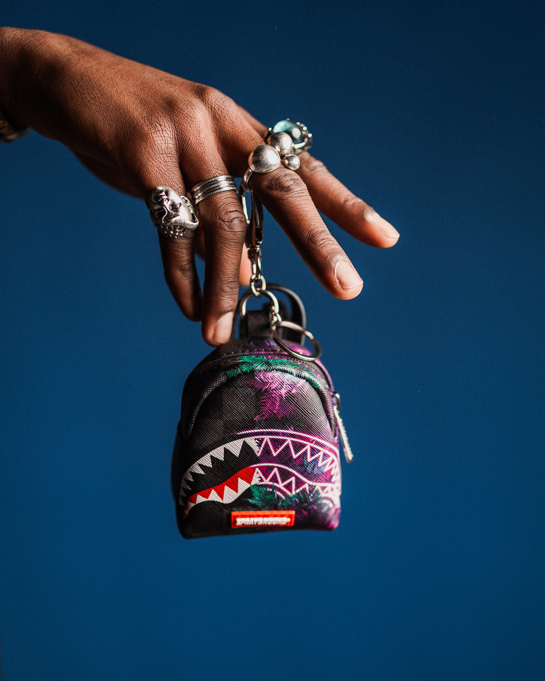 Close-up of the keychain holding small items like coins and chapstick