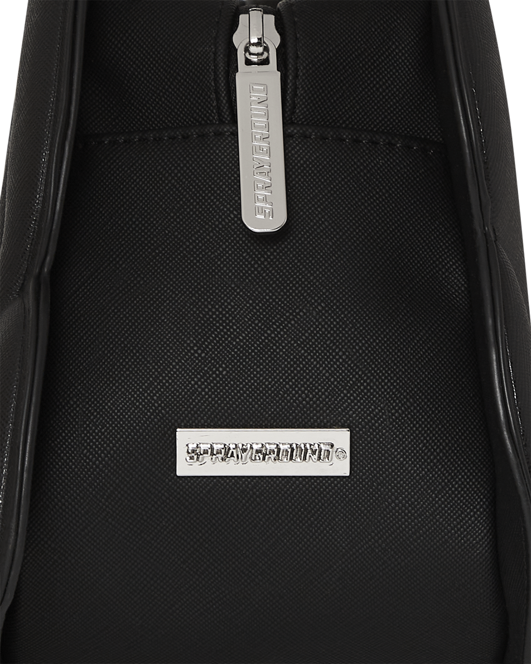 Front view of the Shark Edge handbag showing its saffiano texture and industrial studs