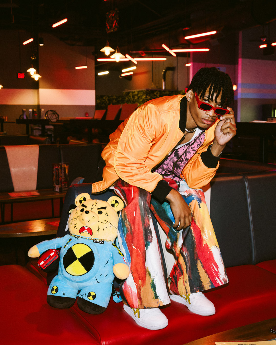 Front view of the Limited Edition Care Bears Teddy Bear Backpack with vibrant colors and pockets.
