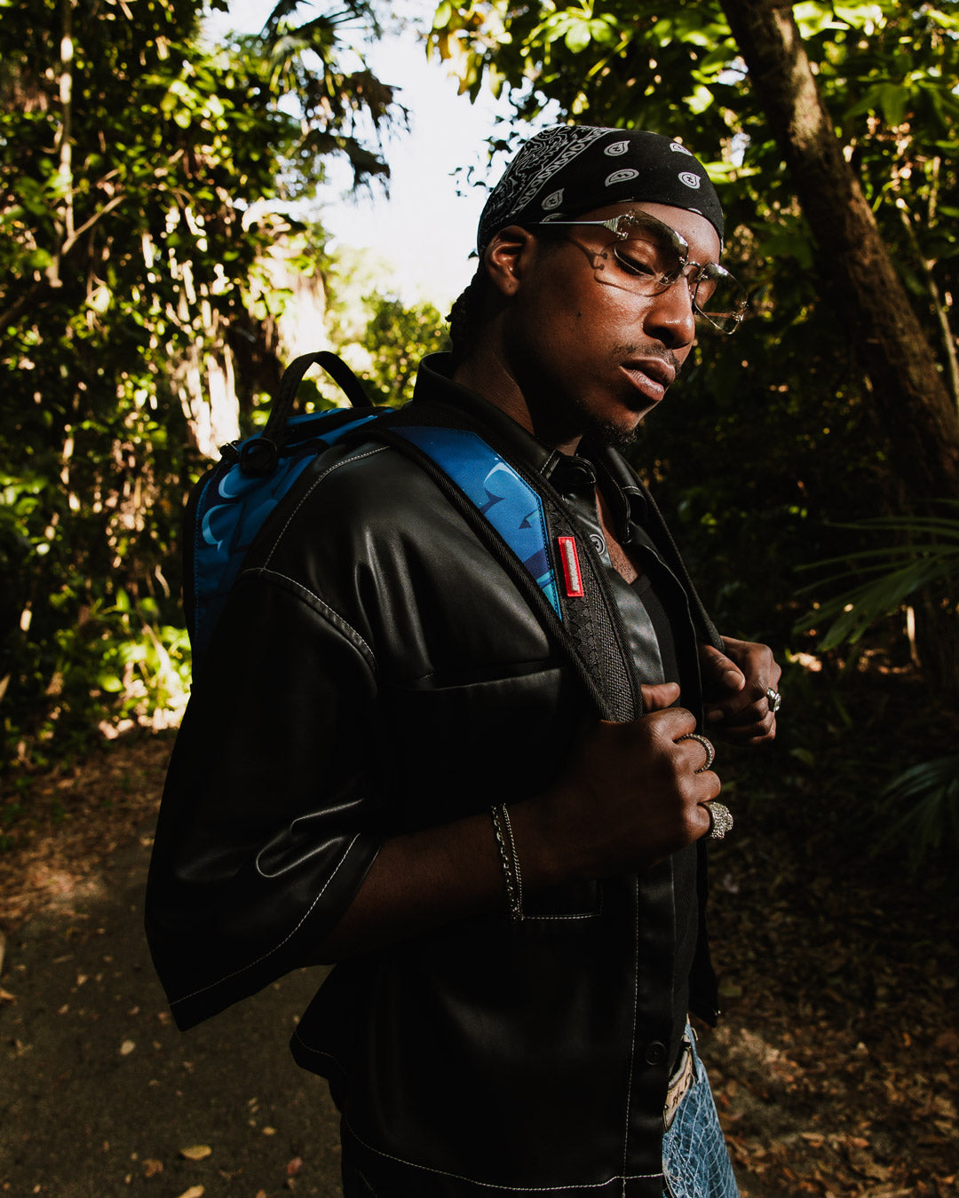 Side view of peak design travel backpack with accessible stash pockets