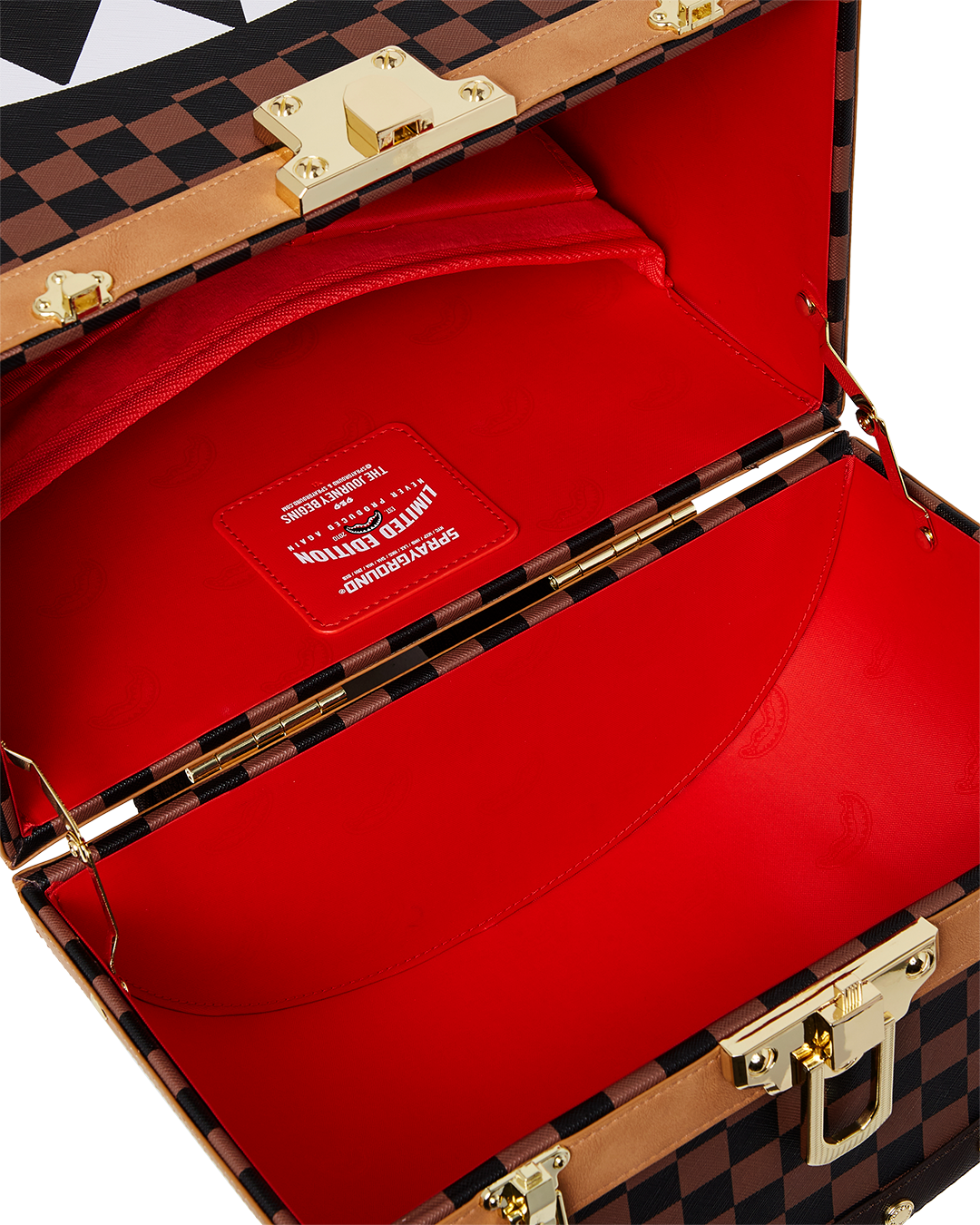 Front view of faux leather trunk backpack with brass lock and embossed studs