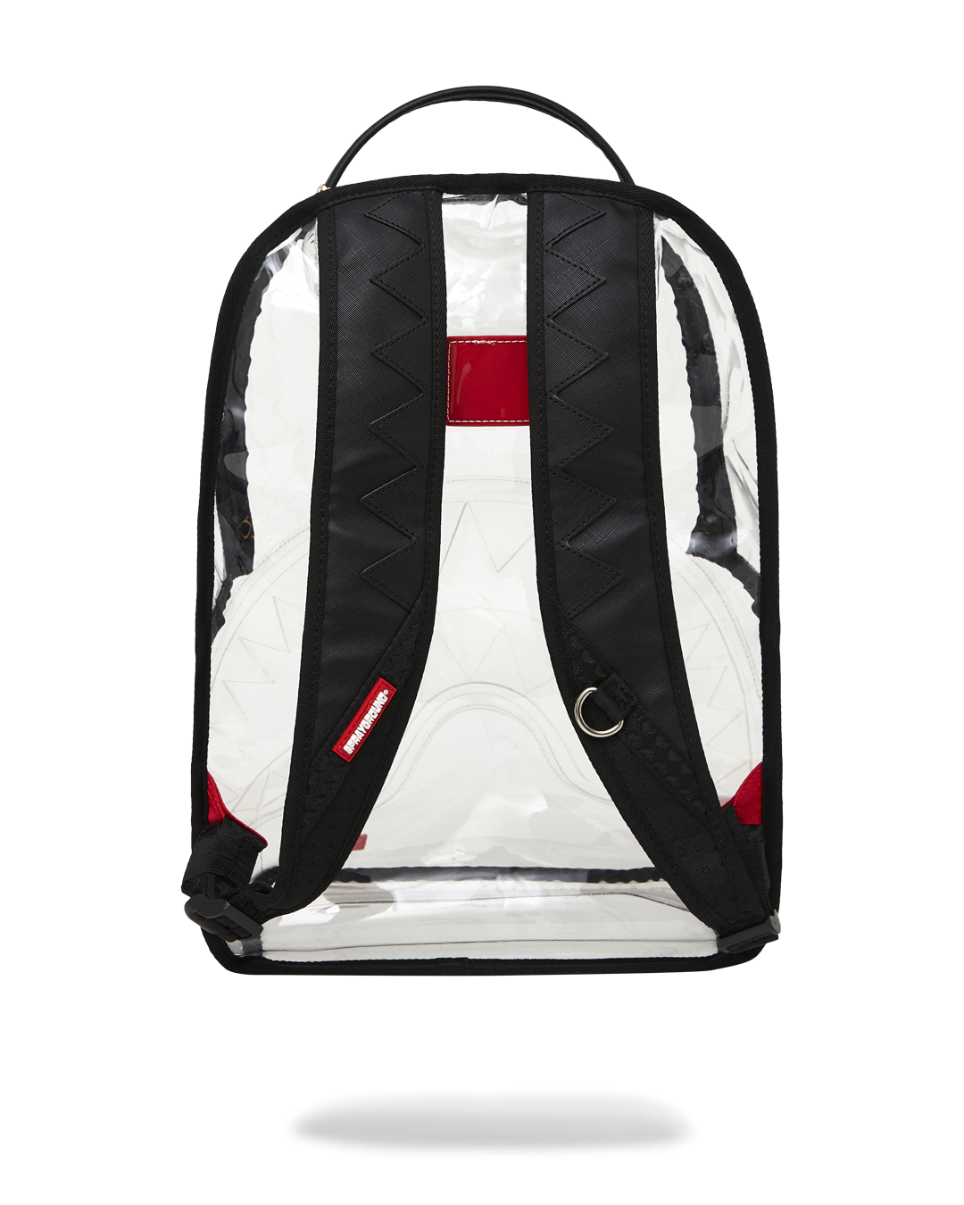 Clear Sprayground shark backpack worn on back, showing off its transparent PVC material and multiple pockets.