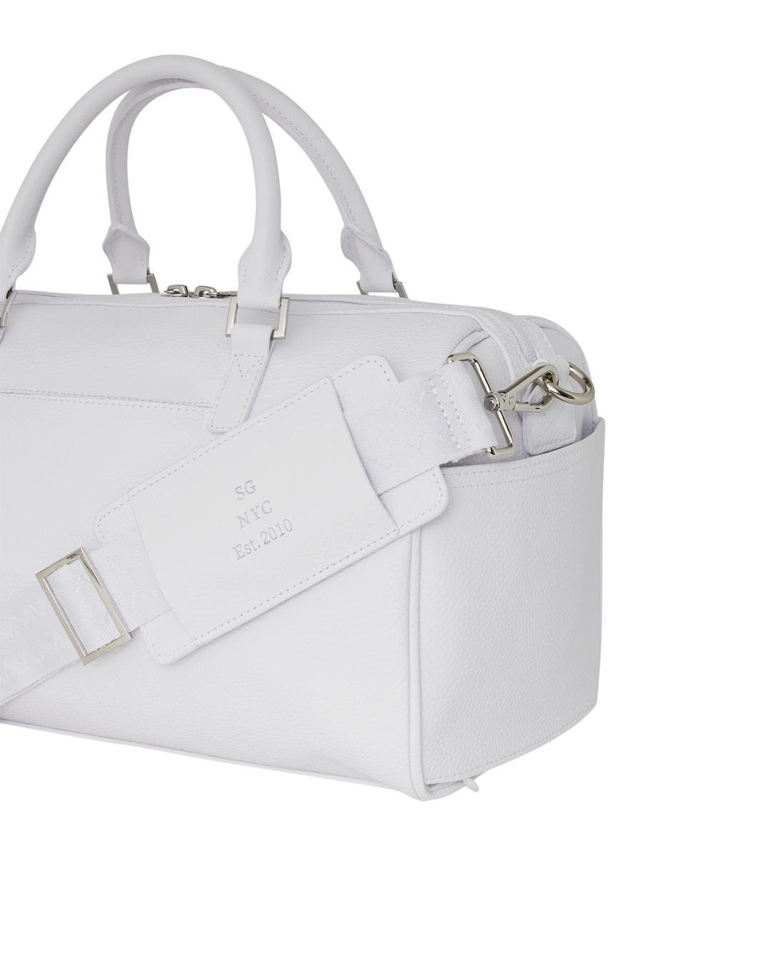 Reflection Duffle Bag with adjustable straps in outdoor setting.
