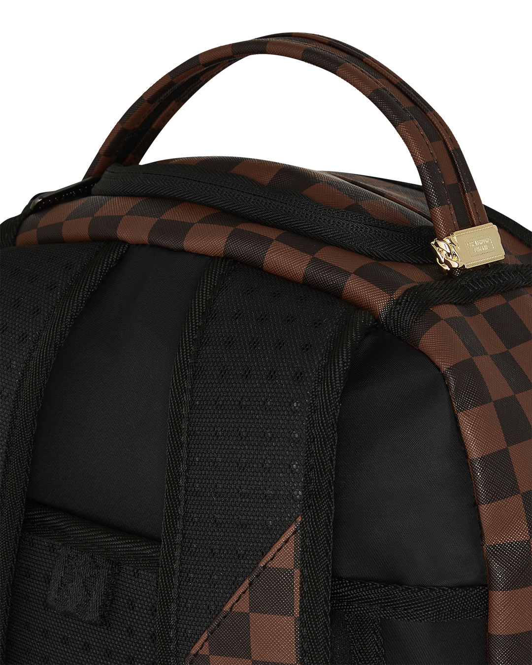 Maison Check backpack worn over shoulder, showcasing sharkmouth detail against city backdrop