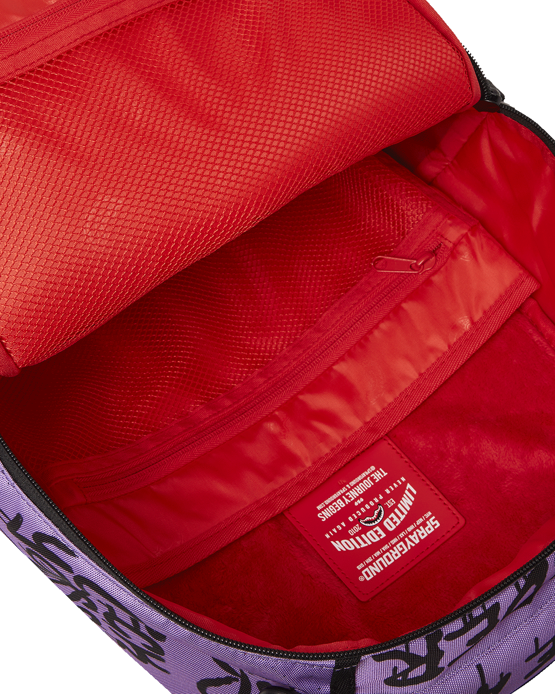 Sprayground Rugrats backpack worn by student on urban campus