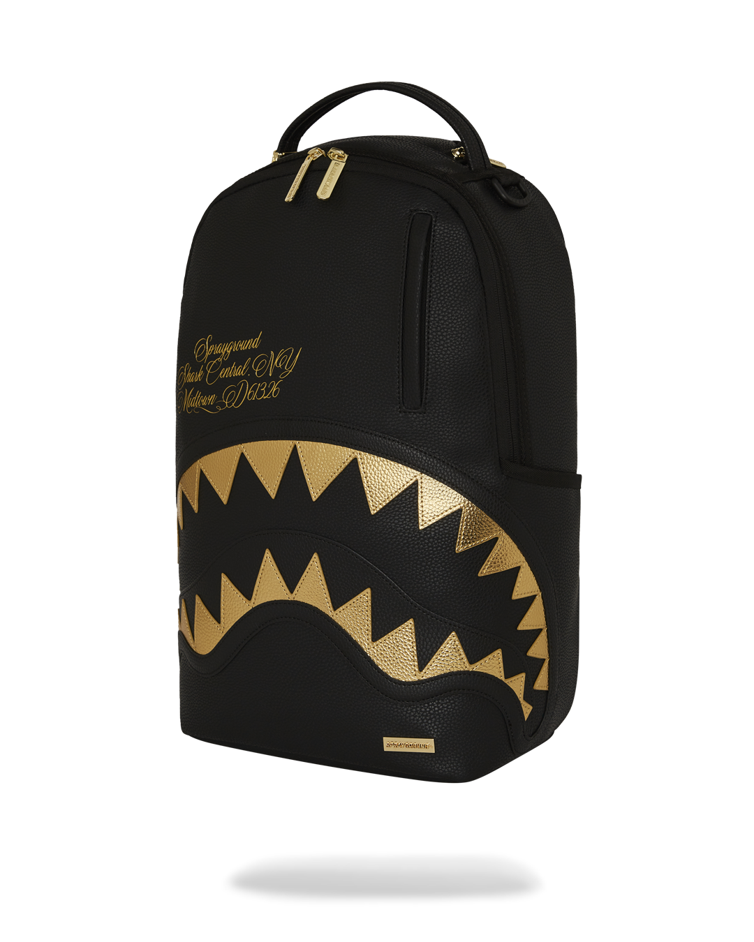 BAPE Shark backpack with faux leather finish and gold accents, side view showing adjustable straps