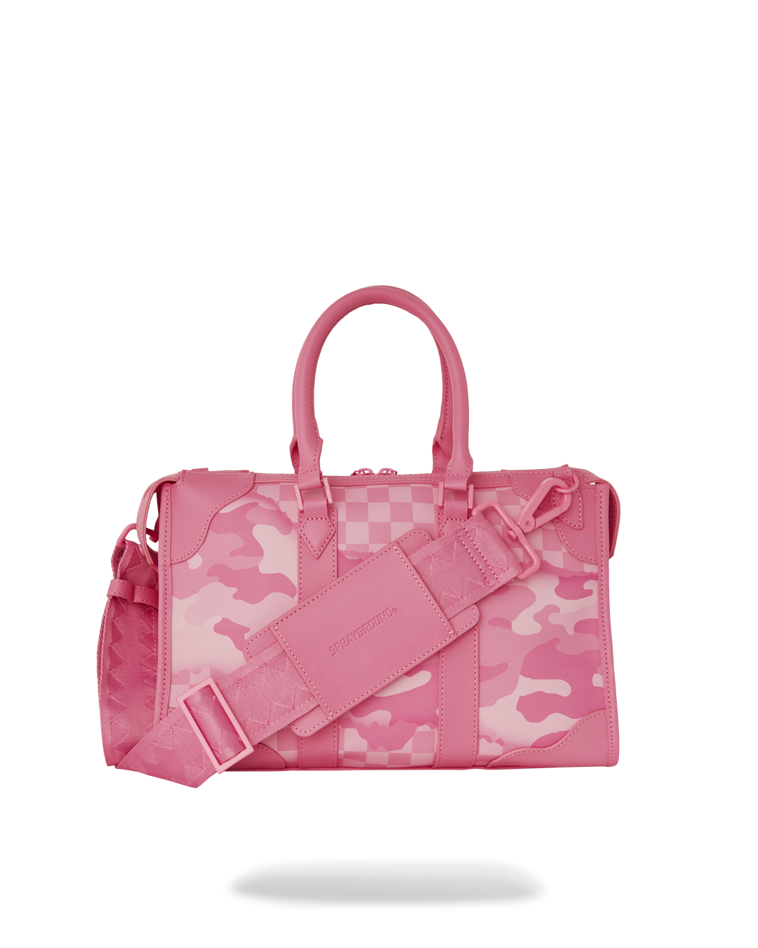 Front view of pyramid-shaped duffle bag on concrete steps in urban NYC setting