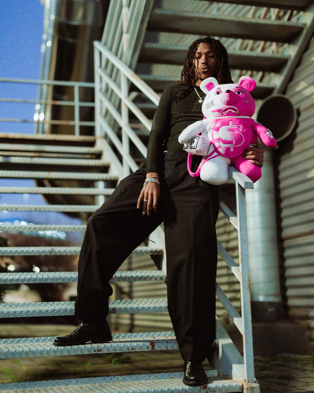 Design Storm Backpack with teddy bear design being used for daily commute