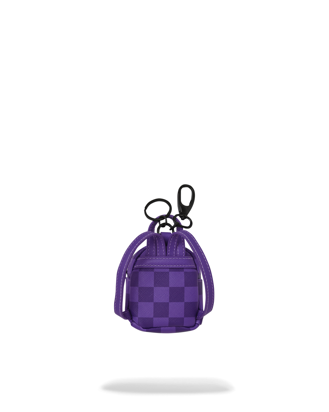 Close-up of the mini backpack keychain showing its stylish design and keyring attachment