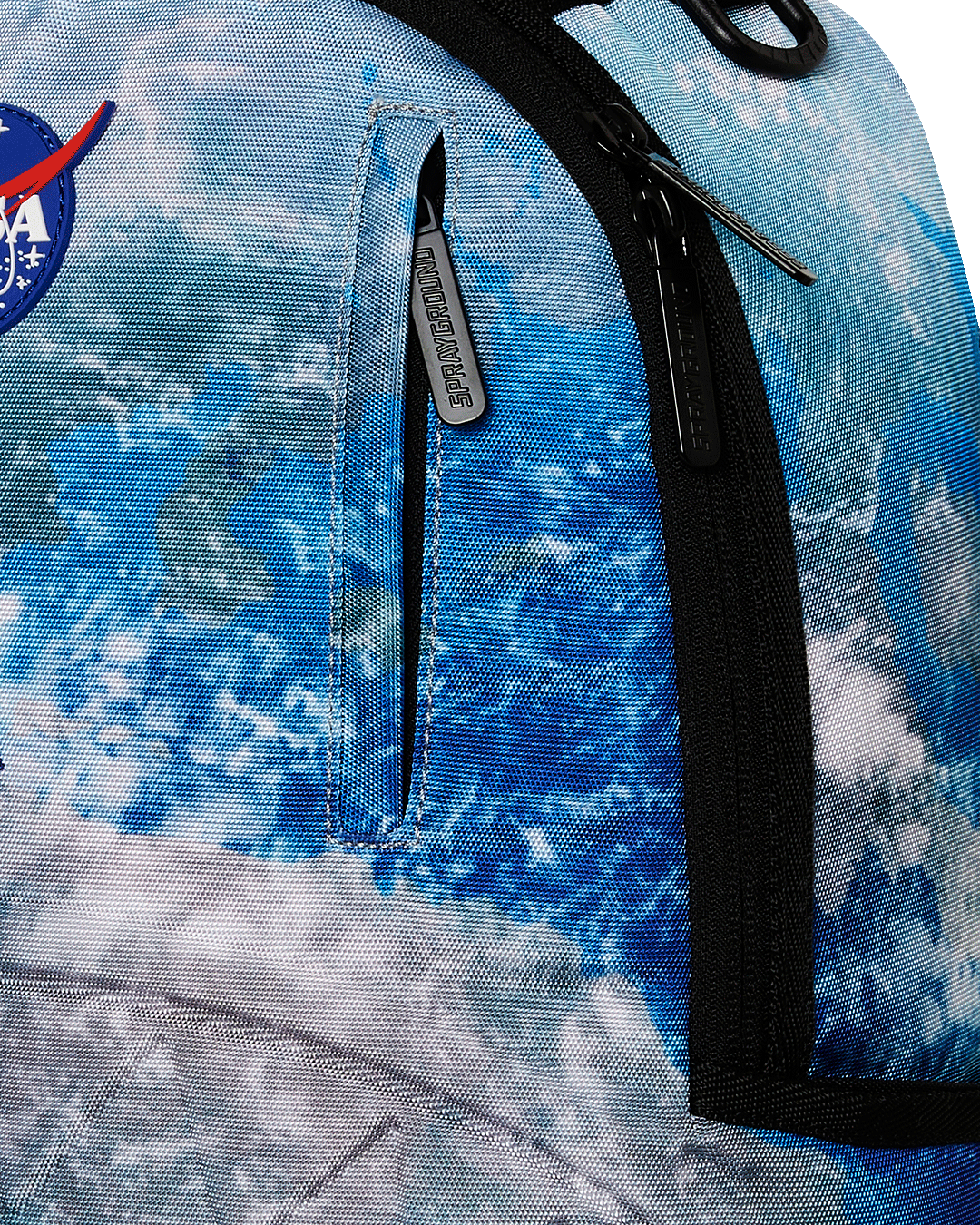 Sprayground NASA Collaboration Limited Edition Laptop Backpack from the front, showcasing its embossed design and front zipper pocket.
