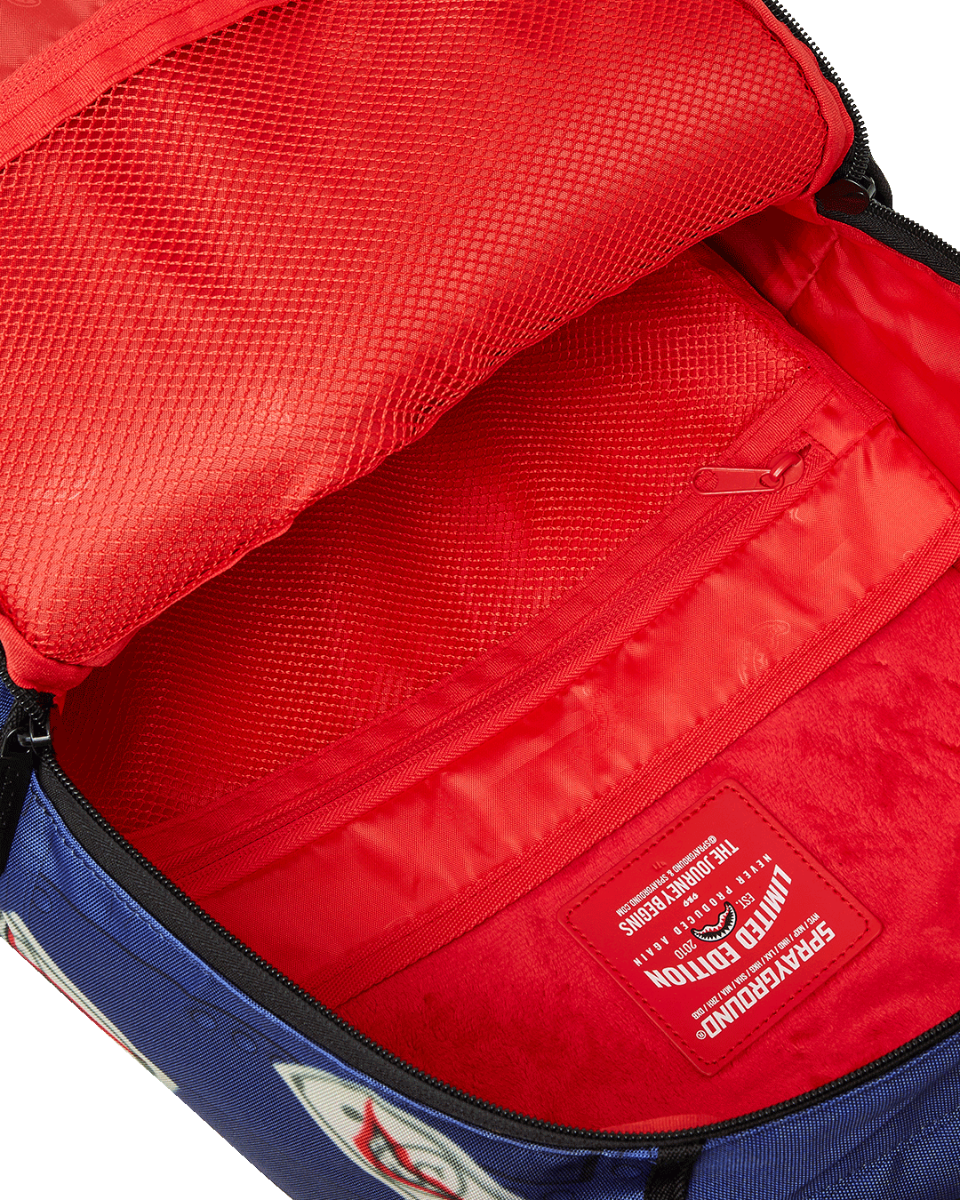 Interior view of the leather laptop backpack with velour compartment and mesh organizer