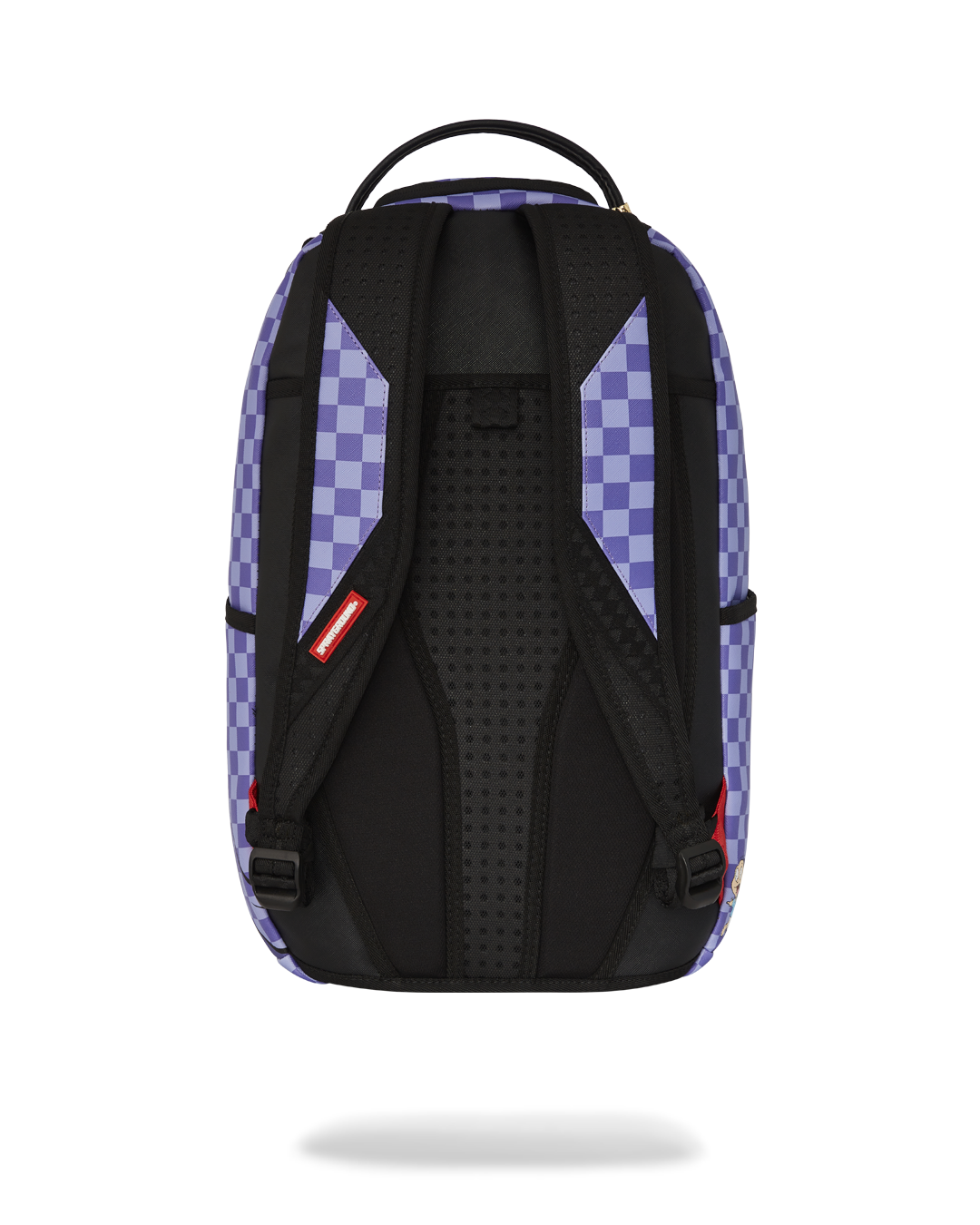 Front view of Sprayground Rugrats backpack showing Reptar and gold zipper details.