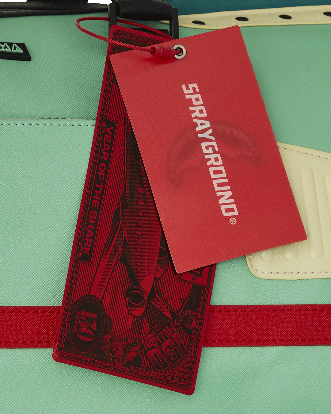 Futurama Planet Express duffle bag in use, packed with travel gear and clothing, demonstrating its spacious interior and durable construction.