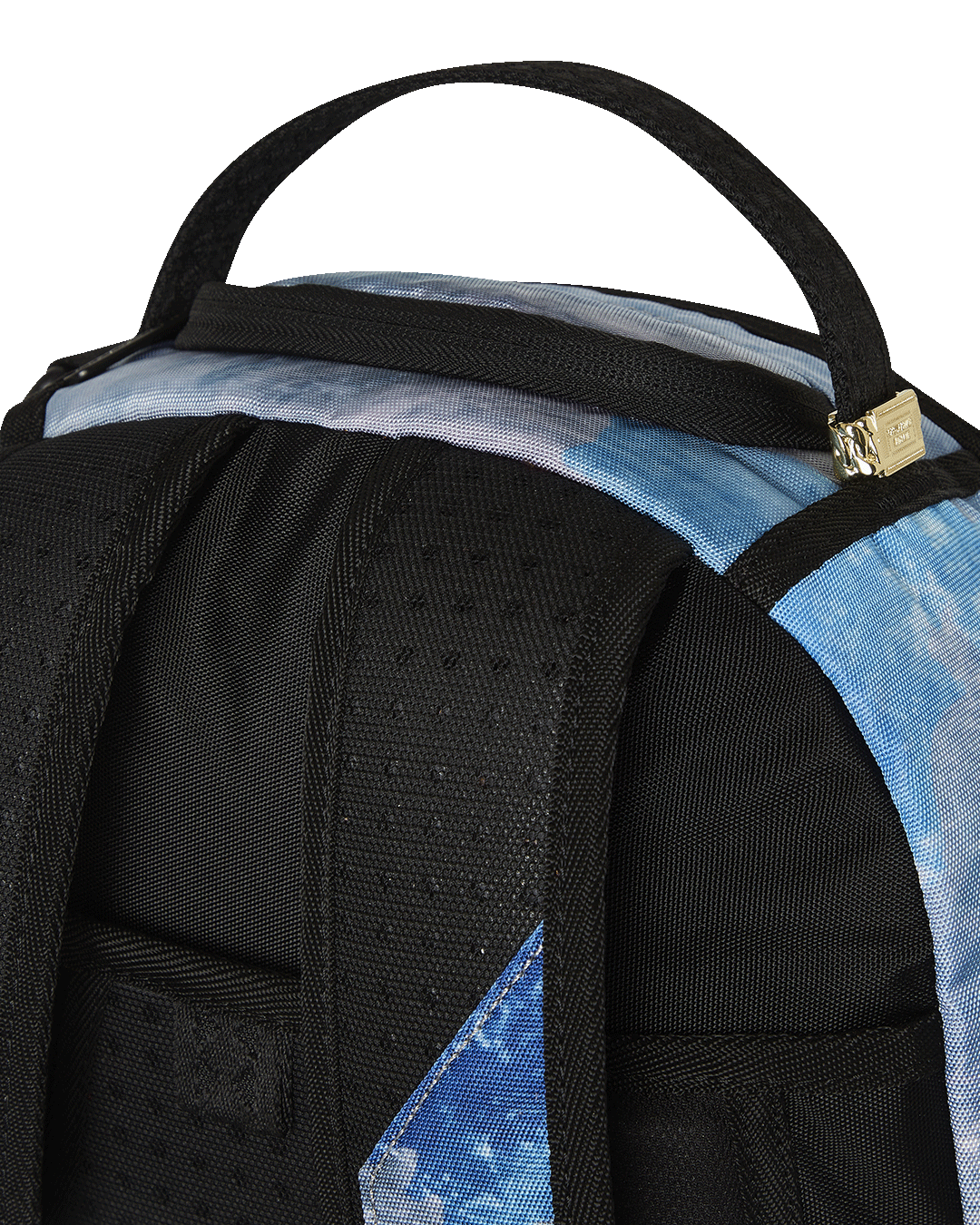 Sprayground NASA Collaboration Limited Edition Laptop Backpack being used by a traveler at an airport, highlighting its travel-friendly features.