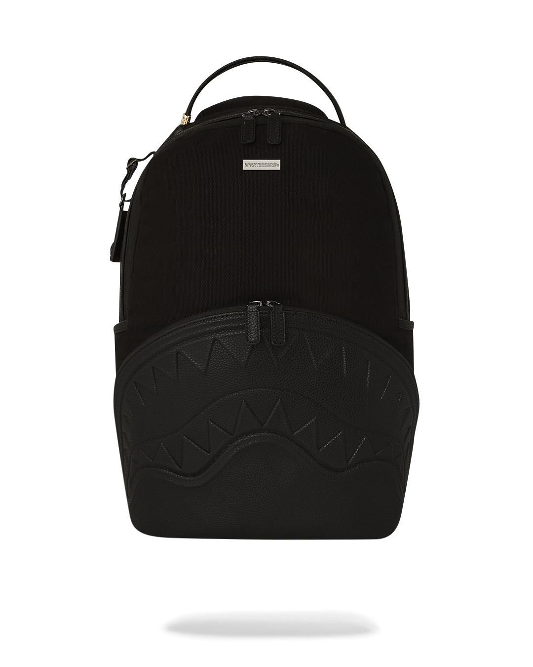 Sprayground Stealth Fang backpack in pink, showcasing its canvas material and PVC details.