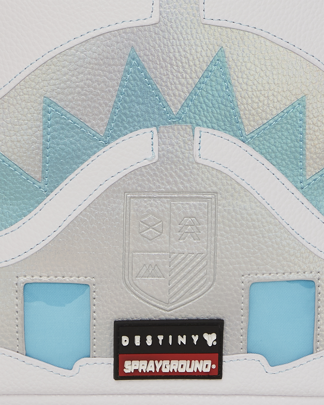 Side angle showing zippered compartments and adjustable ergonomic straps on the official collab backpack