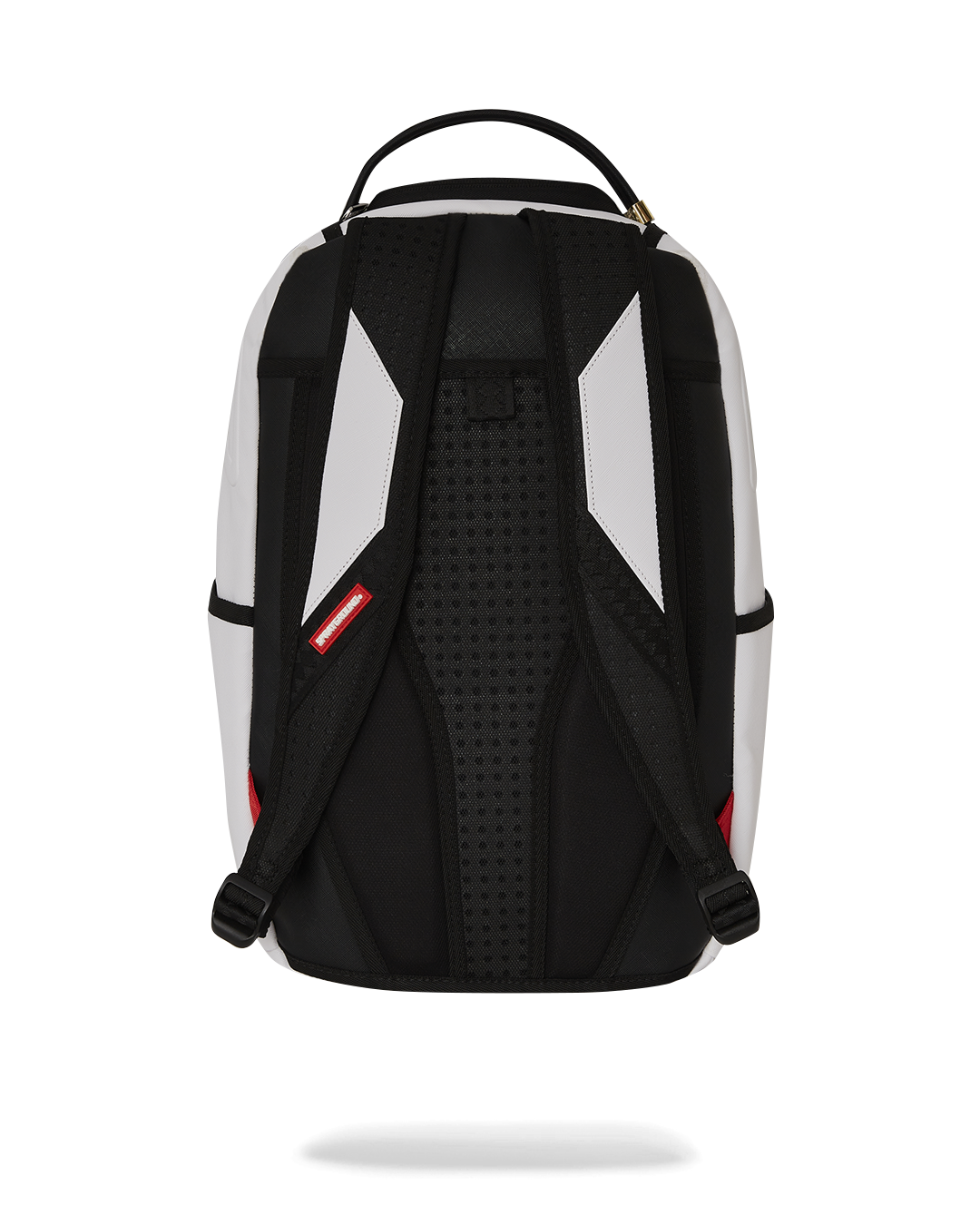 Custom graffiti artist backpack with stencil designs on urban street backdrop