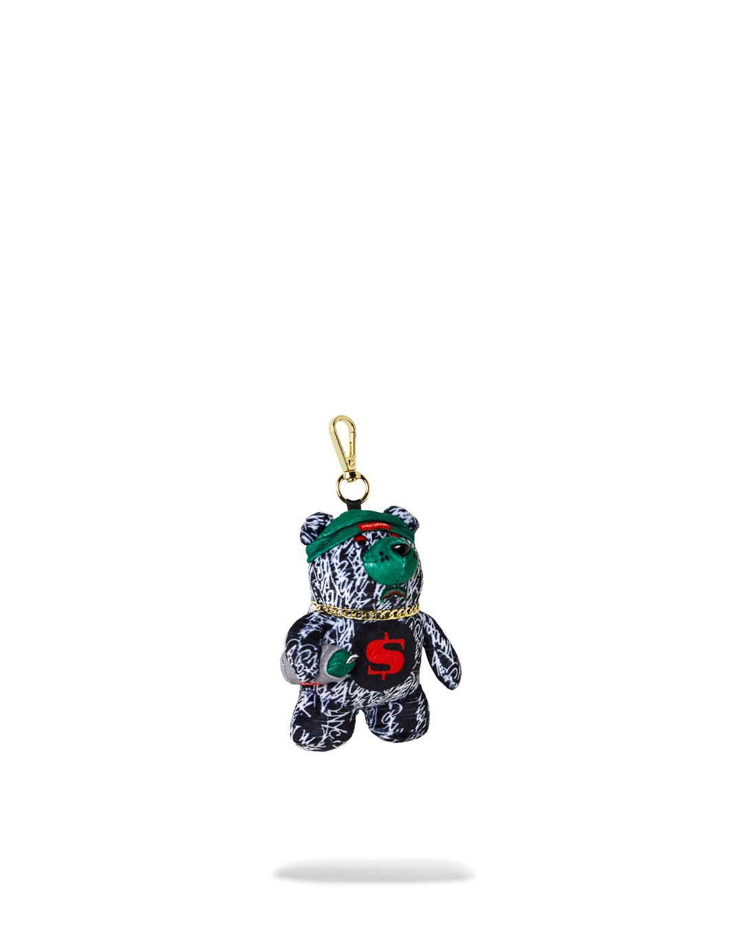 Bear keychain next to keys for size comparison