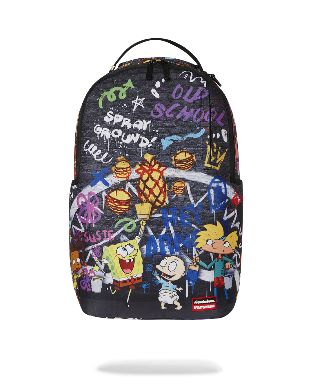 Front view of the Limited Edition pink Sprayground backpack showcasing its vibrant design and gold zippers.
