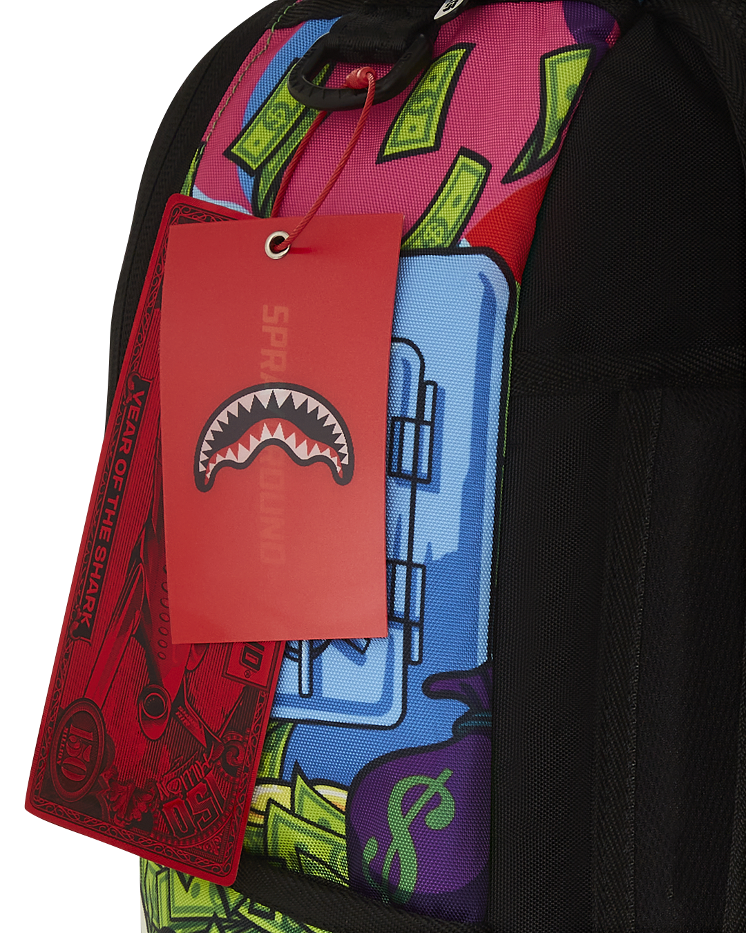 Lifestyle shot with travel backpack slid onto carry-on luggage handle, perfect for commuting.