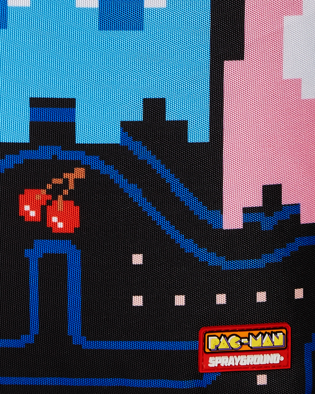 Woman wearing Pacman backpack with city skyline in background