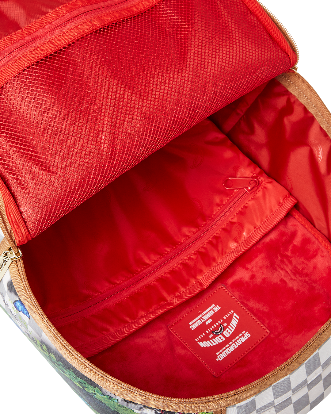 Open interior view showing laptop pocket and mesh organizer inside faux leather backpack