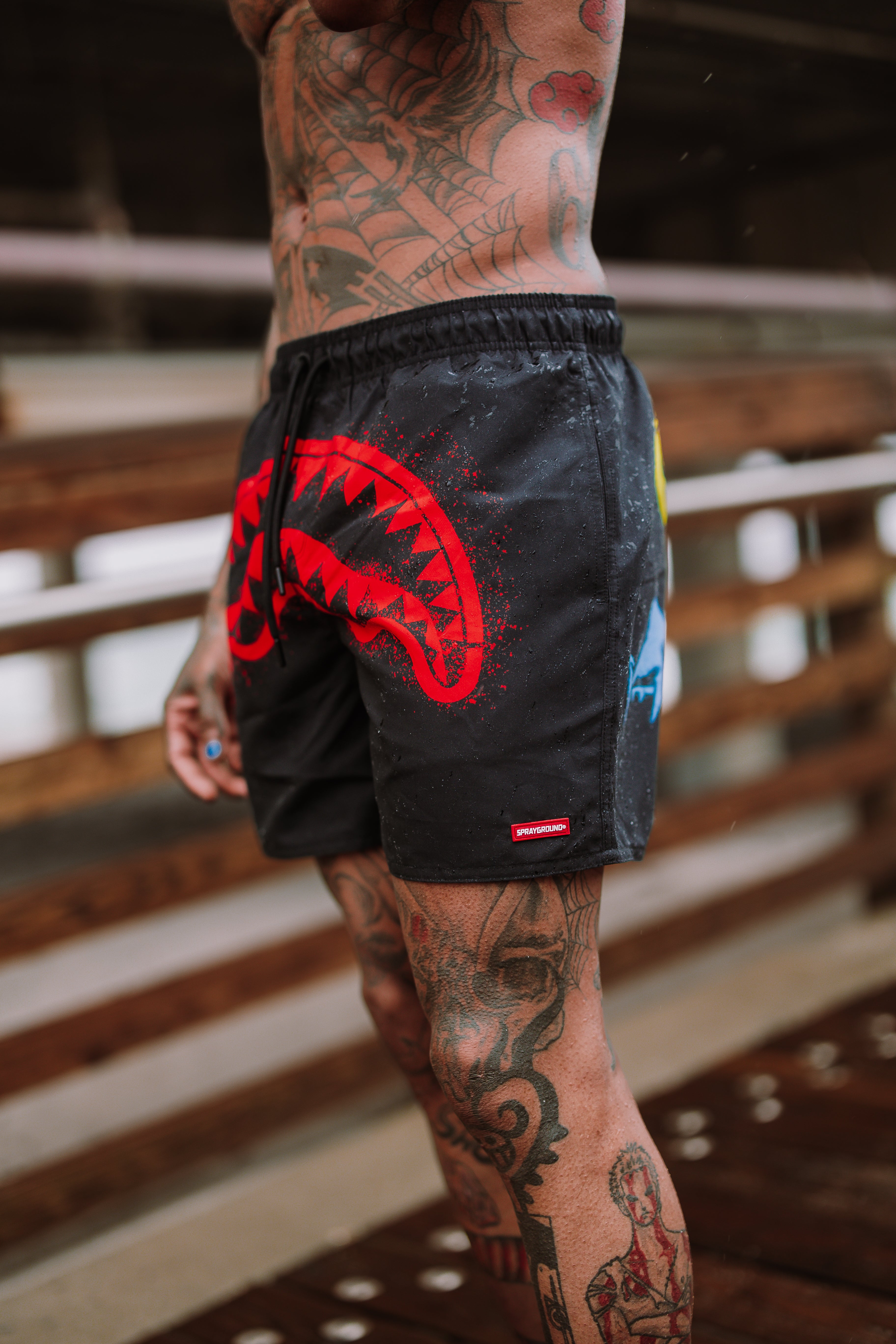 Detail shot of side pockets on mens swim trunks