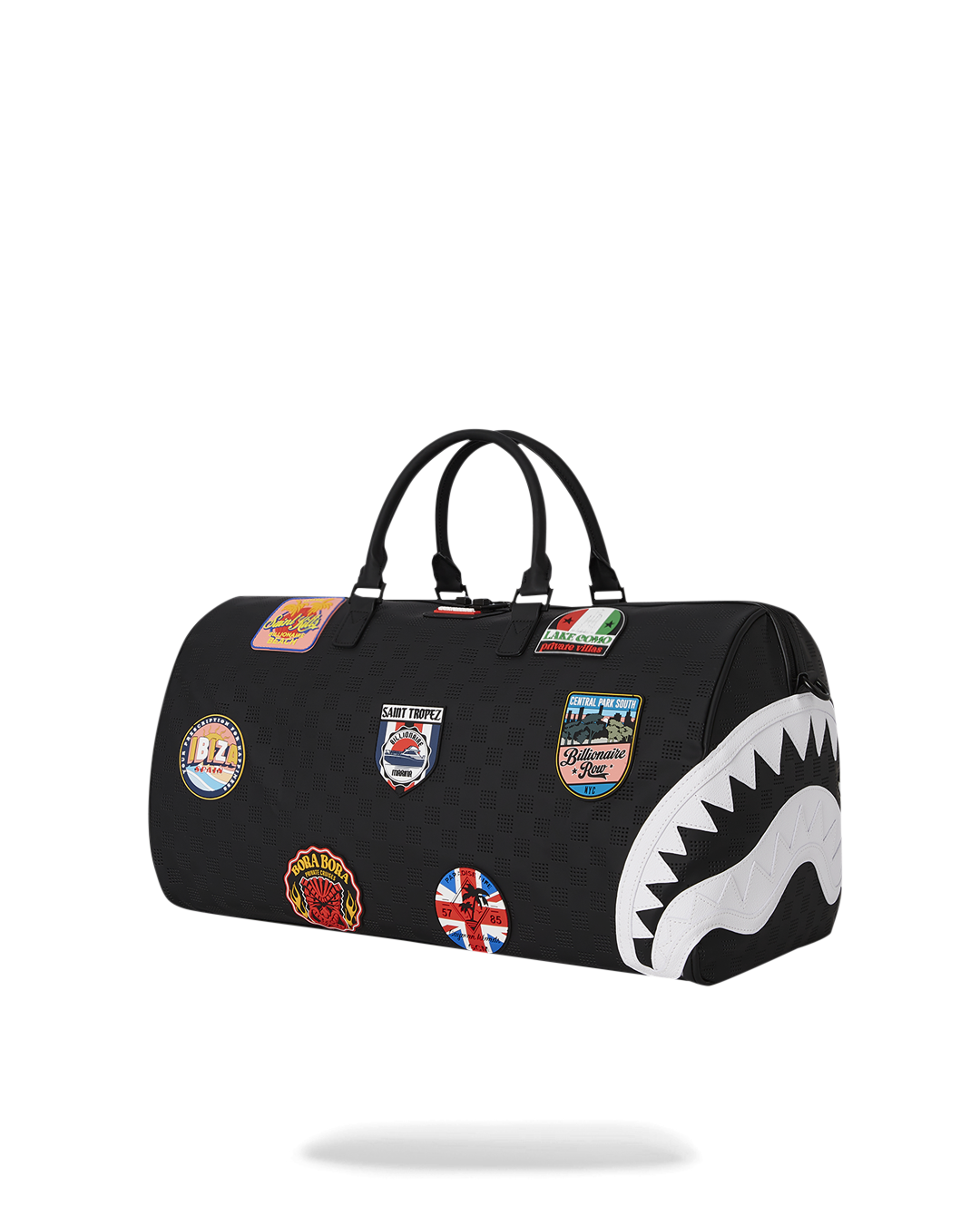 Front view of the designer duffle bag with shark mouth detail and gold zippers